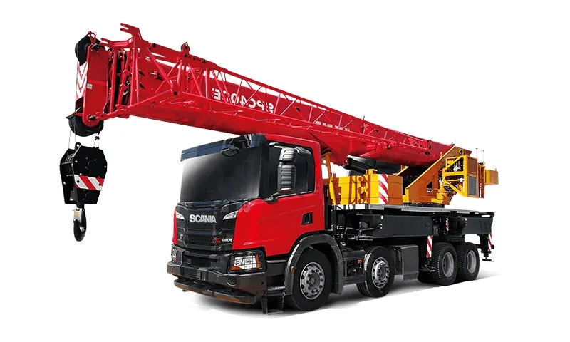 A mobile crane operator in training, learning health and safety procedures.